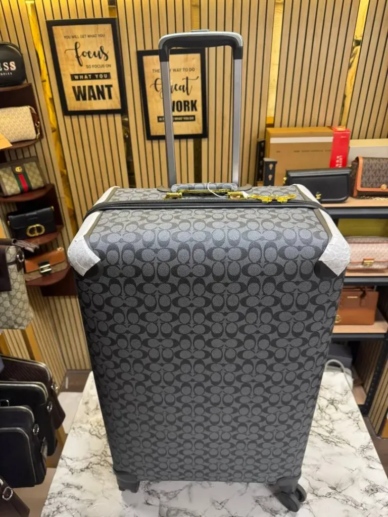 Coach_Signature_Canvas_Carry-On_Rolling_Luggage_Premium_Quality_Trolley_Bag